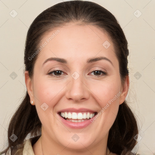 Joyful white young-adult female with long  brown hair and brown eyes