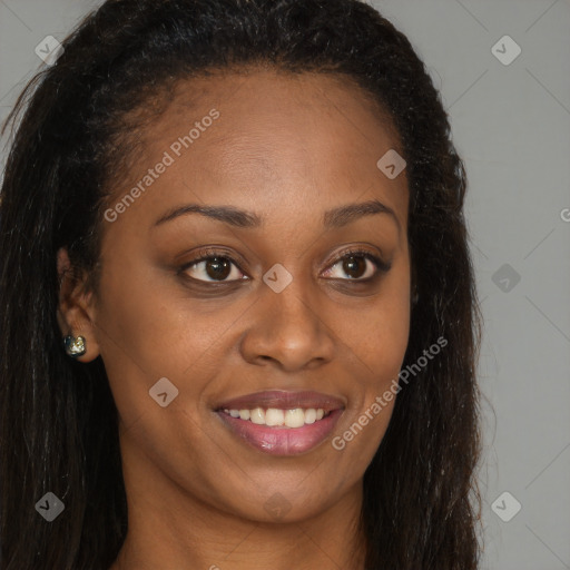 Joyful black young-adult female with long  brown hair and brown eyes