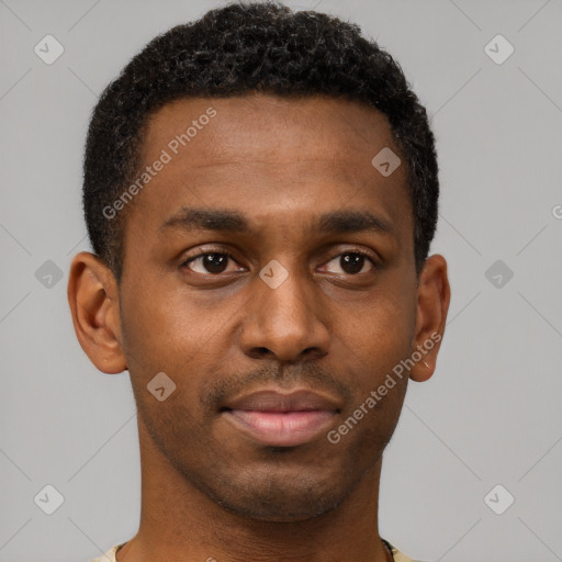 Neutral black young-adult male with short  brown hair and brown eyes