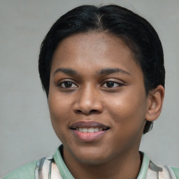 Joyful latino young-adult female with short  brown hair and brown eyes