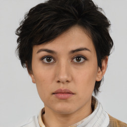 Neutral white young-adult female with short  brown hair and brown eyes