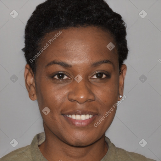 Joyful black young-adult female with short  brown hair and brown eyes