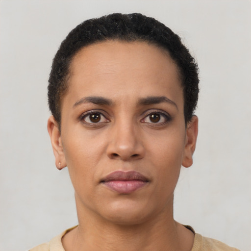 Neutral latino young-adult female with short  black hair and brown eyes