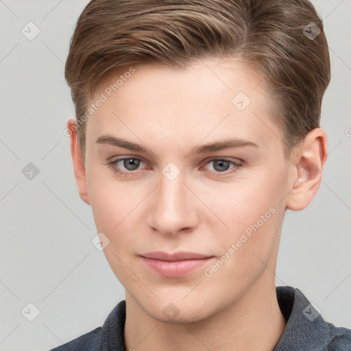 Joyful white young-adult female with short  brown hair and grey eyes