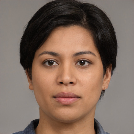 Neutral asian young-adult female with medium  brown hair and brown eyes