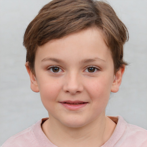 Joyful white child female with short  brown hair and brown eyes