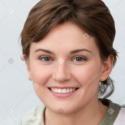 Joyful white young-adult female with medium  brown hair and blue eyes