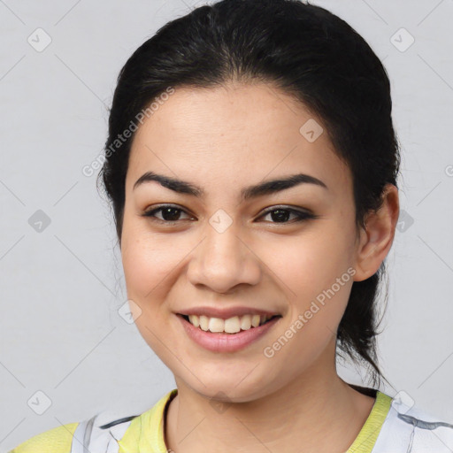 Joyful latino young-adult female with medium  black hair and brown eyes