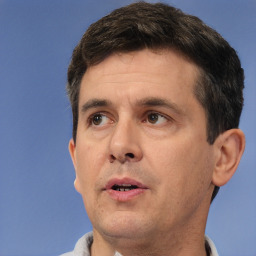 Neutral white adult male with short  brown hair and brown eyes