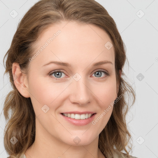 Joyful white young-adult female with medium  brown hair and blue eyes