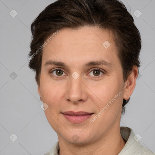 Joyful white adult female with medium  brown hair and brown eyes