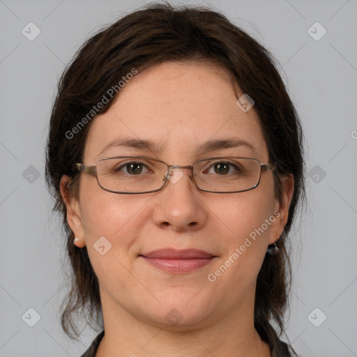 Joyful white adult female with medium  brown hair and grey eyes