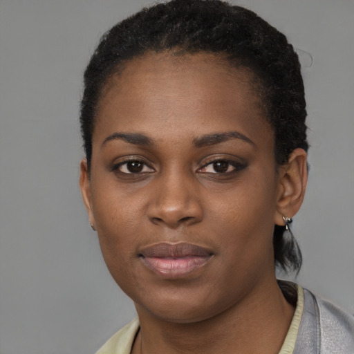 Neutral black young-adult female with short  black hair and brown eyes