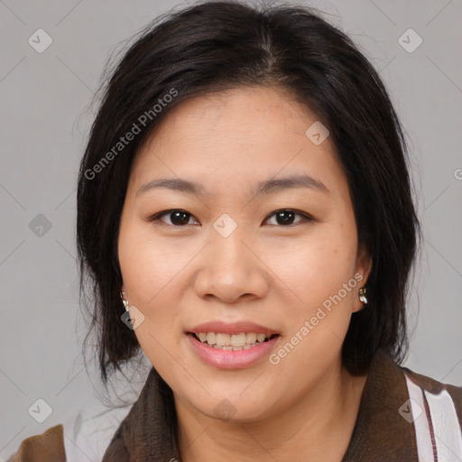 Joyful asian young-adult female with medium  brown hair and brown eyes