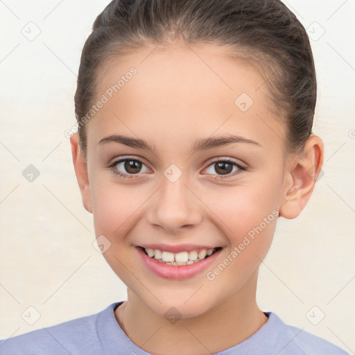 Joyful white child female with short  brown hair and brown eyes