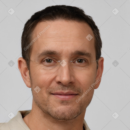 Joyful white adult male with short  brown hair and brown eyes