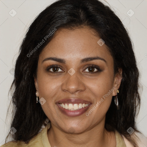 Joyful black young-adult female with long  brown hair and brown eyes