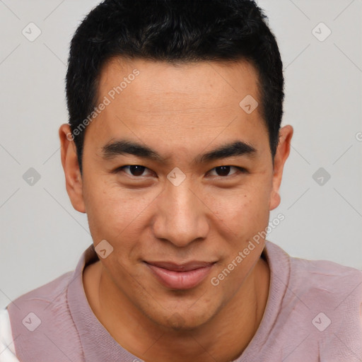 Joyful asian young-adult male with short  brown hair and brown eyes