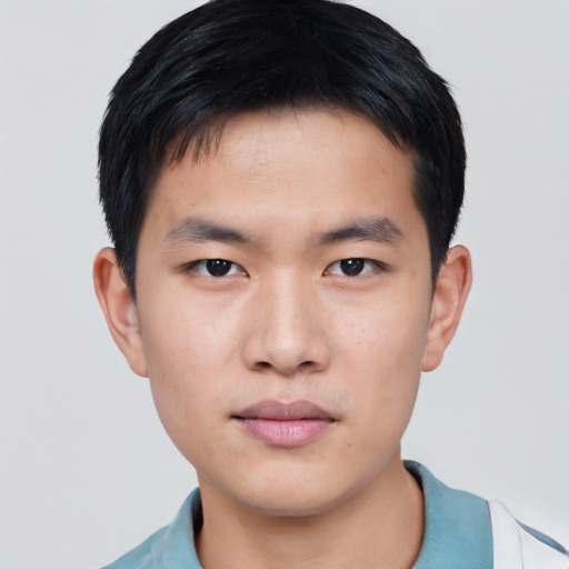 Neutral asian young-adult male with short  brown hair and brown eyes