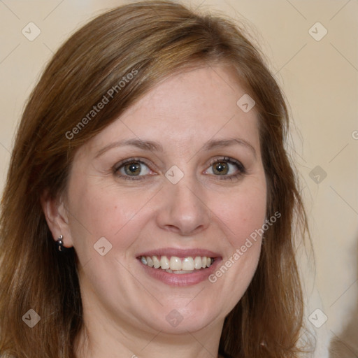 Joyful white adult female with long  brown hair and brown eyes