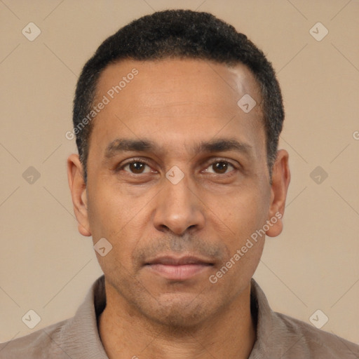 Neutral latino adult male with short  black hair and brown eyes