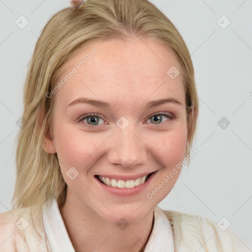 Joyful white young-adult female with medium  brown hair and blue eyes