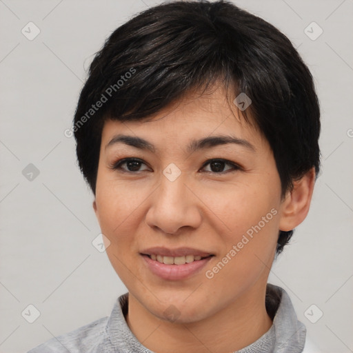 Joyful asian young-adult female with short  black hair and brown eyes