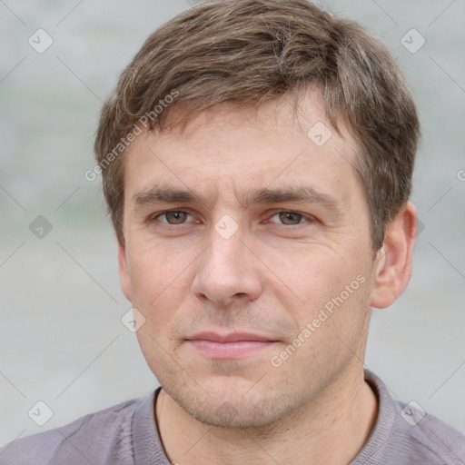 Neutral white young-adult male with short  brown hair and grey eyes