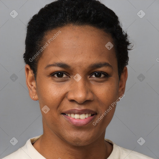 Joyful black young-adult female with short  black hair and brown eyes