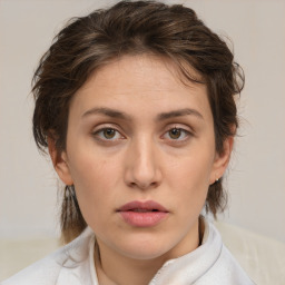 Neutral white young-adult female with medium  brown hair and brown eyes