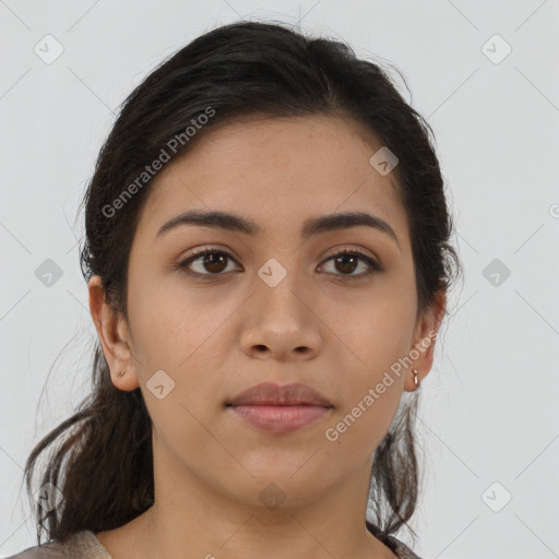 Joyful latino young-adult female with medium  brown hair and brown eyes