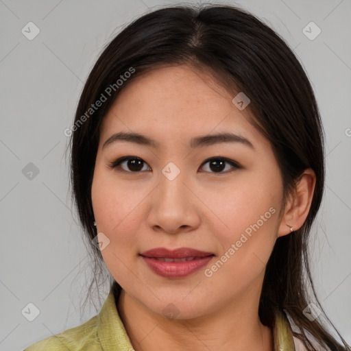 Joyful asian young-adult female with medium  brown hair and brown eyes