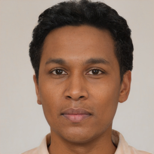 Neutral black young-adult male with short  black hair and brown eyes