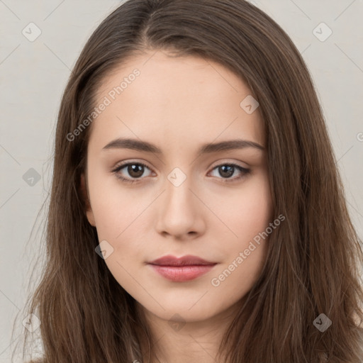 Neutral white young-adult female with long  brown hair and brown eyes