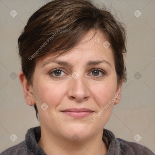 Joyful white adult female with medium  brown hair and grey eyes