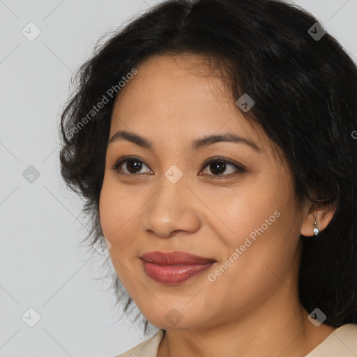 Joyful asian young-adult female with long  brown hair and brown eyes