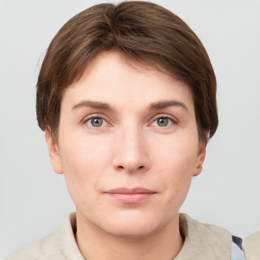 Neutral white young-adult female with short  brown hair and grey eyes