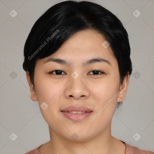 Joyful asian young-adult female with short  black hair and brown eyes