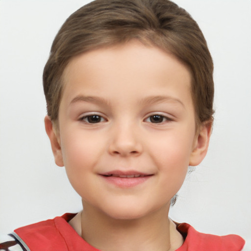 Joyful white child female with short  brown hair and brown eyes