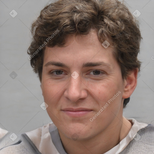 Joyful white adult female with short  brown hair and brown eyes