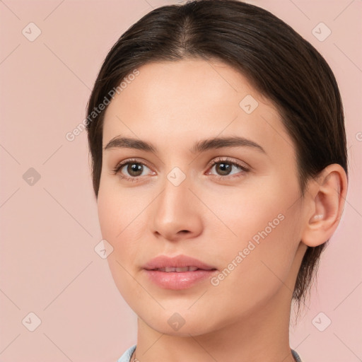 Neutral white young-adult female with medium  brown hair and brown eyes