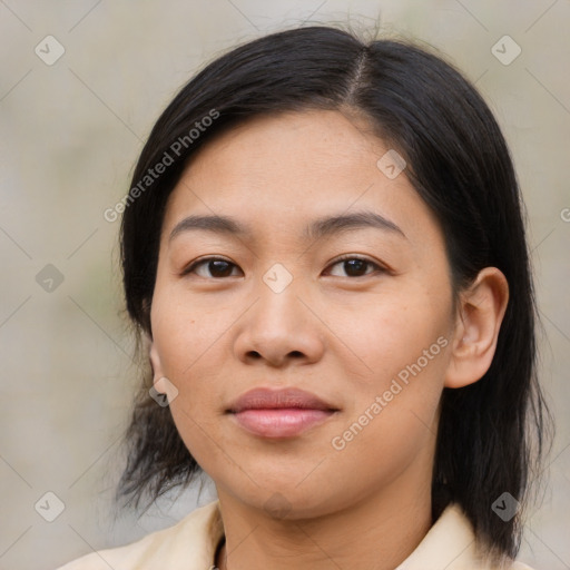 Joyful asian young-adult female with medium  brown hair and brown eyes