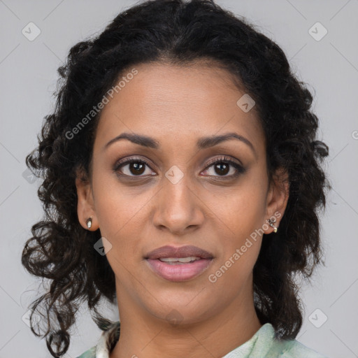 Joyful black young-adult female with medium  brown hair and brown eyes