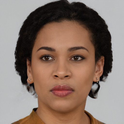 Neutral latino young-adult female with short  brown hair and brown eyes