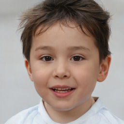 Joyful white child male with short  brown hair and brown eyes