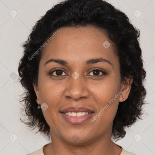 Joyful latino adult female with short  brown hair and brown eyes