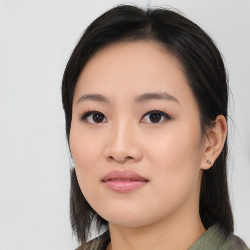 Neutral asian young-adult female with medium  black hair and brown eyes