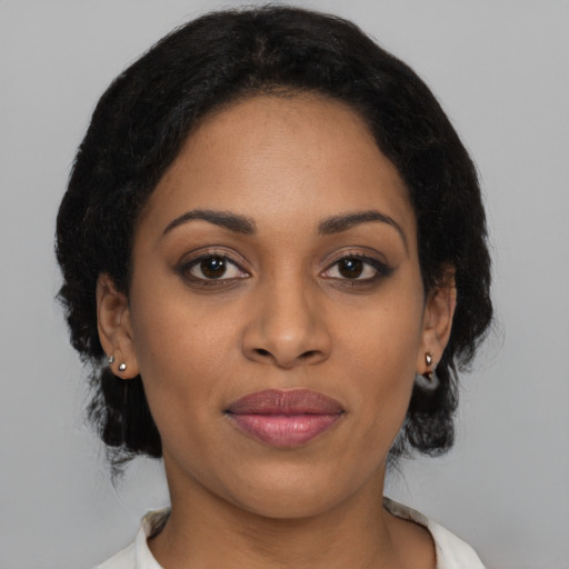 Joyful latino young-adult female with medium  black hair and brown eyes