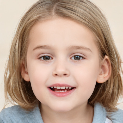 Joyful white child female with medium  brown hair and blue eyes