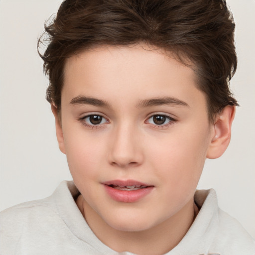 Joyful white child female with short  brown hair and brown eyes